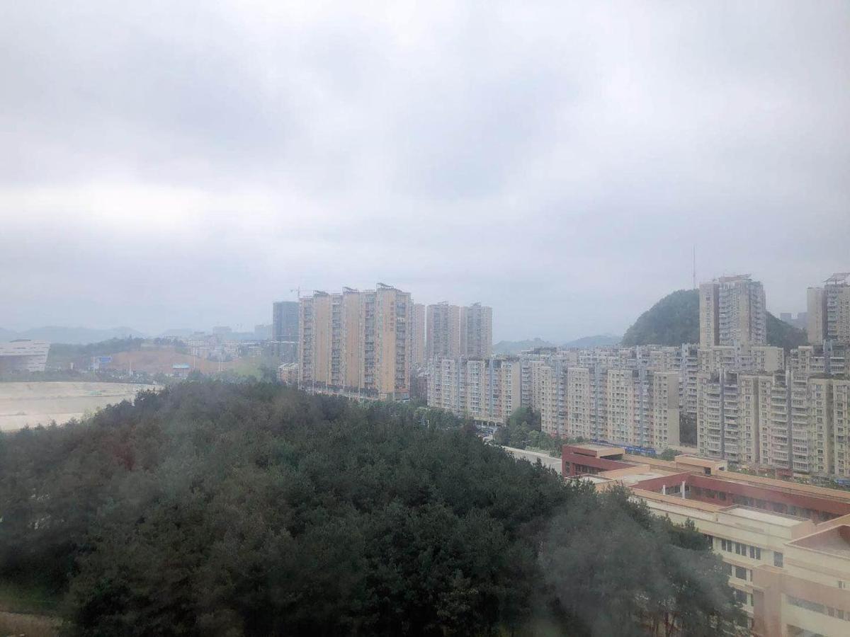 Iu Hotel Guiyang Olympic Sports Center China Resources Vientiane エクステリア 写真